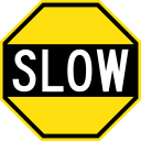 Early_Australian_road_sign_-_Slow_(octagon).svg